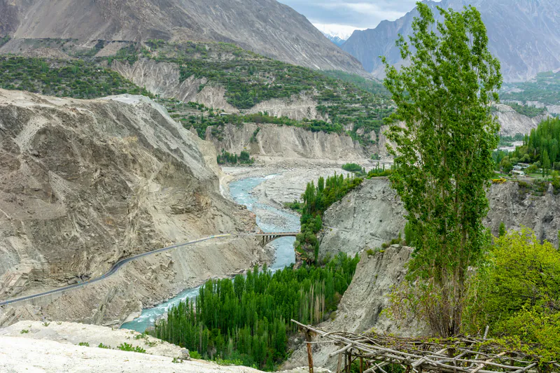 The Karakoram Highway and a bridge above the Hunza River at Ganish